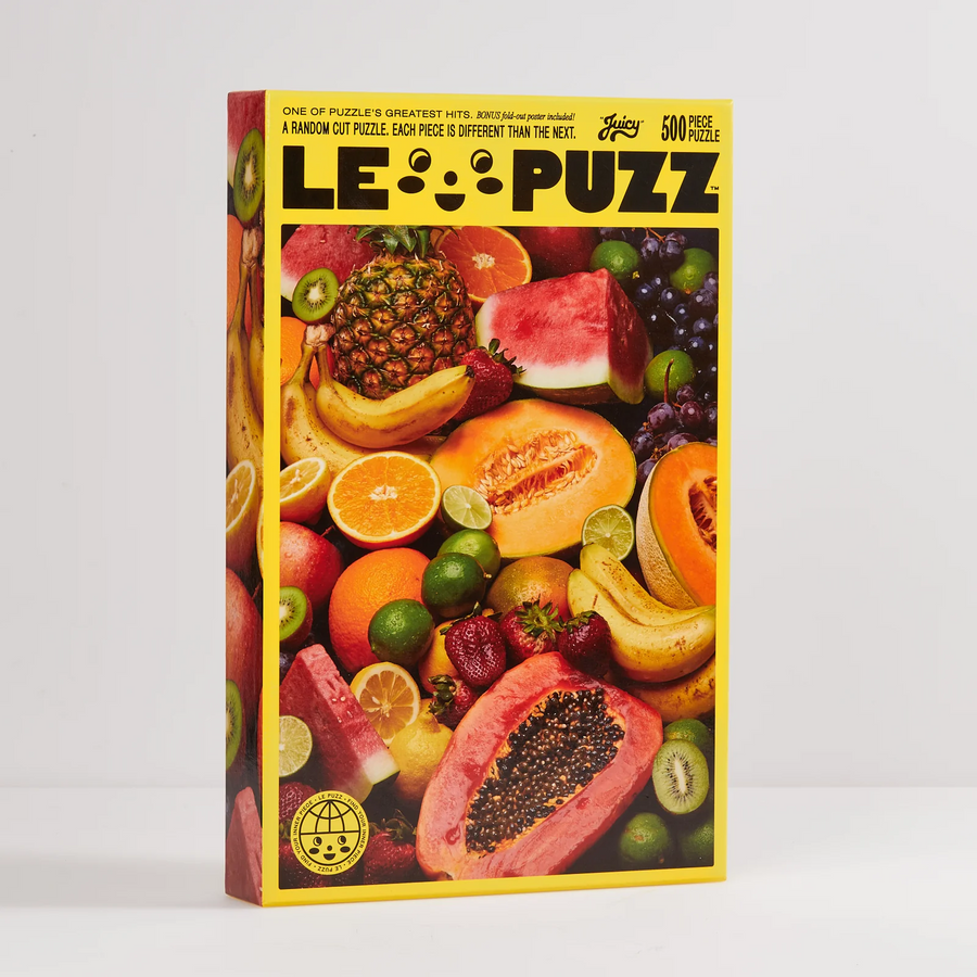 Le Puzz 500 Piece Juicy puzzle depicting a tropical fruit scene.