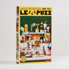 Le Puzz 500 Piece "OOPS!" Puzzle featuring household items spilling artfully.